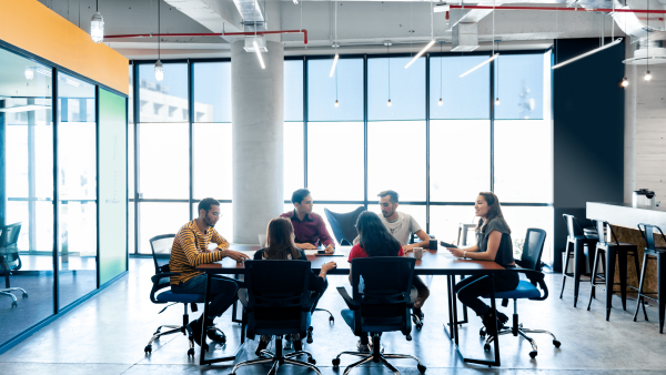 image of people sitting in an office setting collaborating