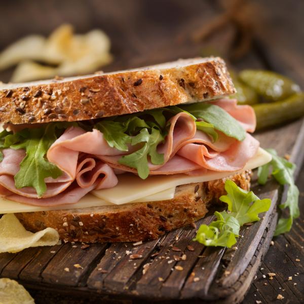 Cheese sandwich on a wooden board