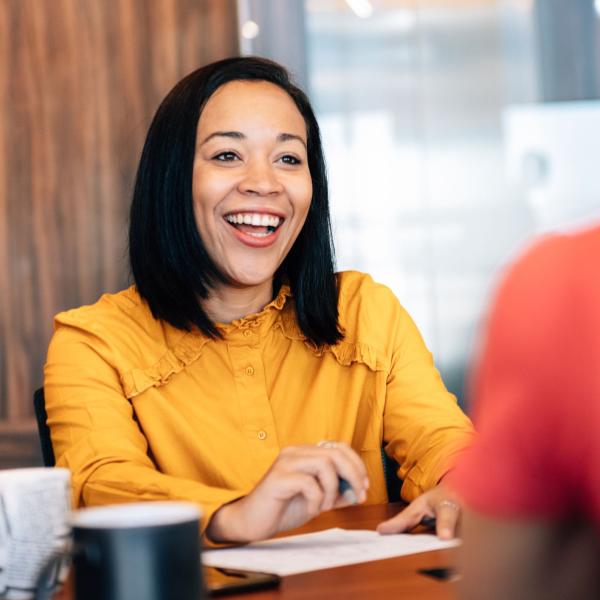 interview candidate smiling back at interviewer