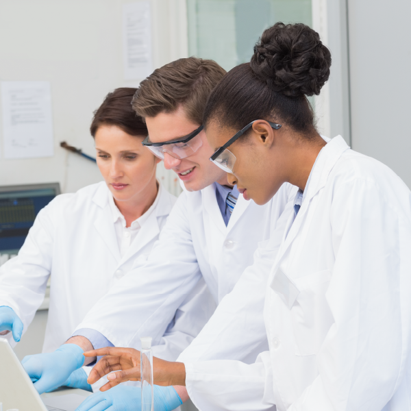 image of 3 lab workers working together