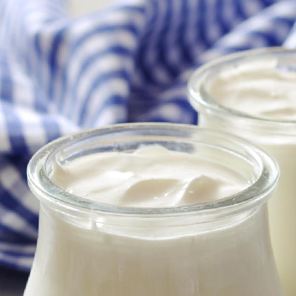 image of yoghurt in a glass bottle