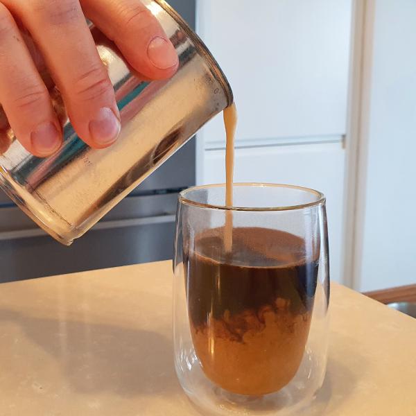 image of coffee pouring into glass