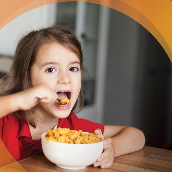 image of a young girl eating cereal