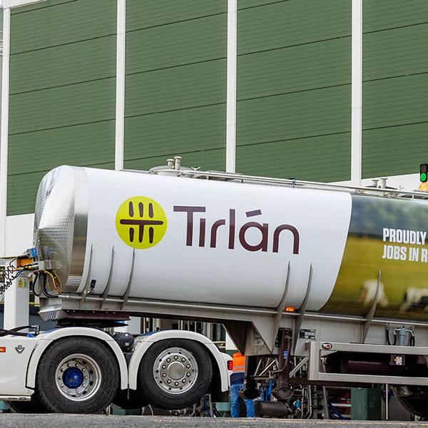 Tirlan truck with logo in factory car park