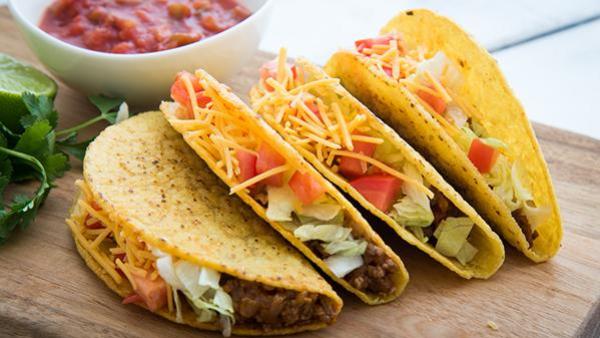 tacos with cheese and tomatos