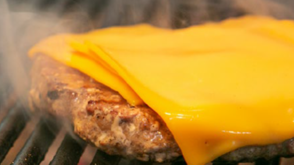 cheese melting on burger