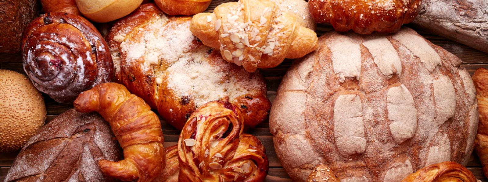 various different types of bread from a bakery