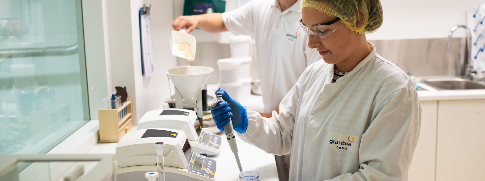 two glanbia employees in oat factory