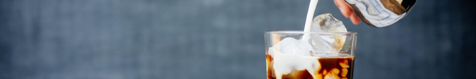 image of coffee being poured into glass