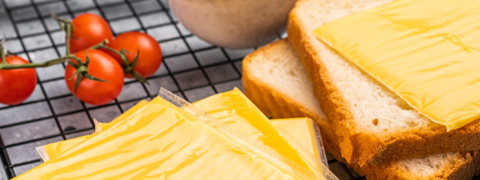 sliced cheese with baby tomatoes