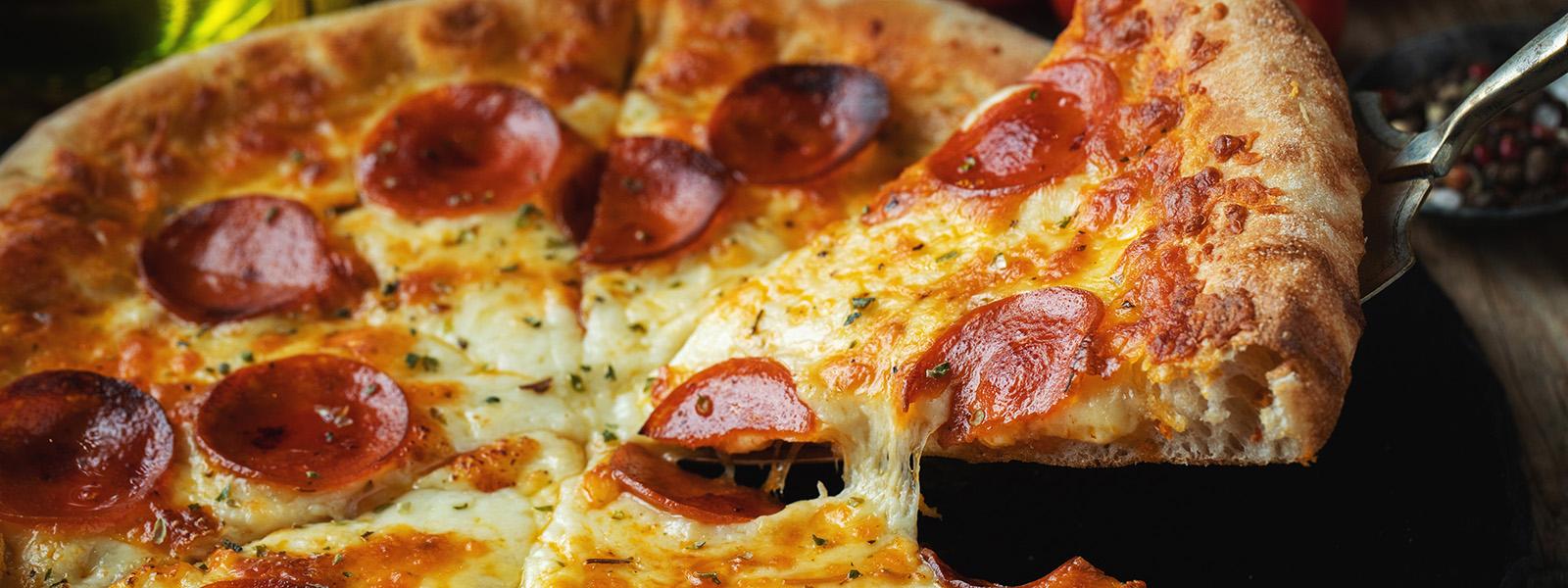 Tasty cheese and pepperoni pizza